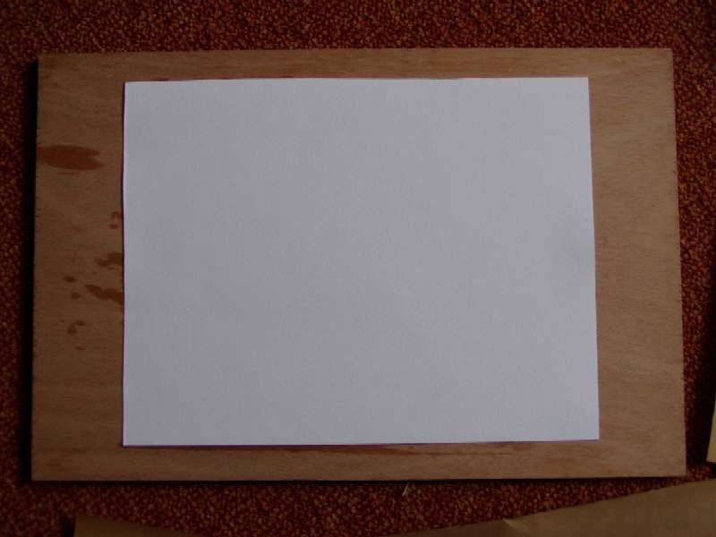 Stap 1 - Papier vlak op plank